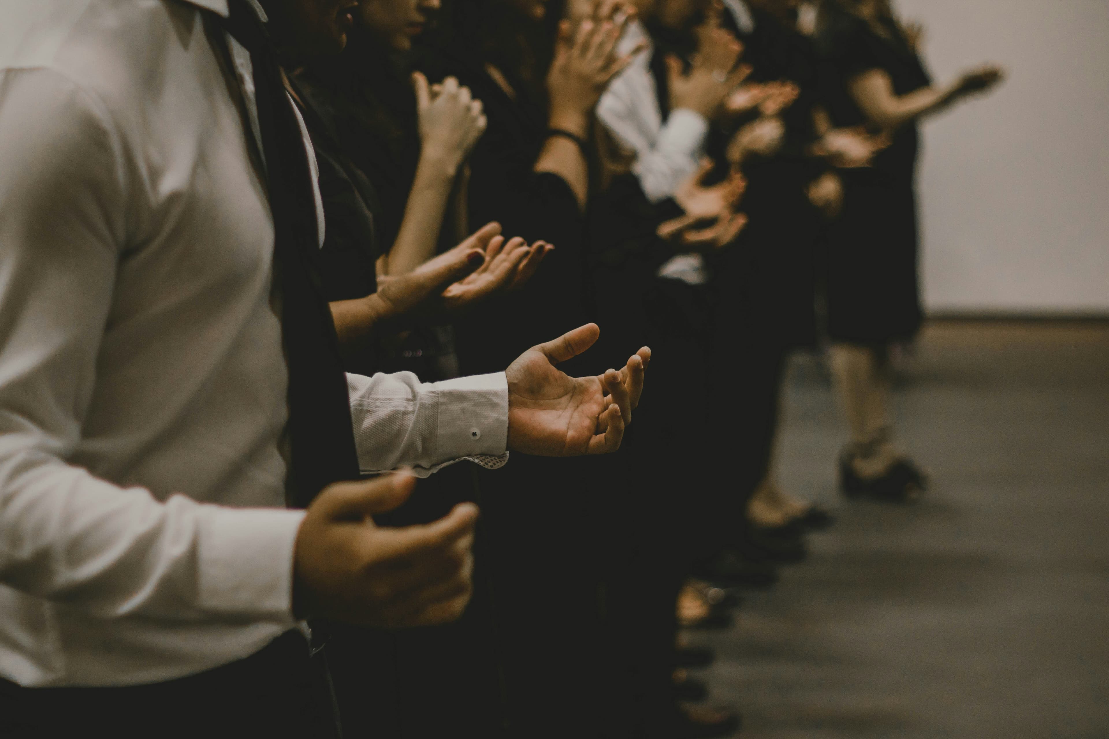 A group of people standing next to each other