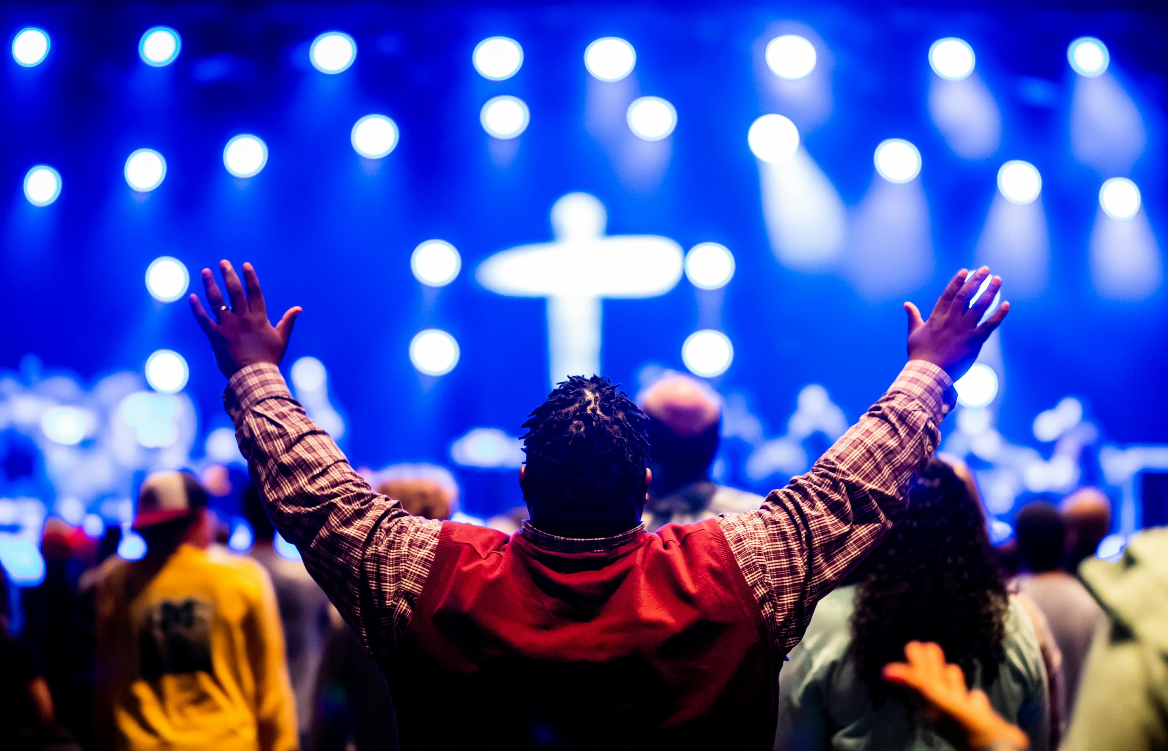 A man standing in front of a crowd of people